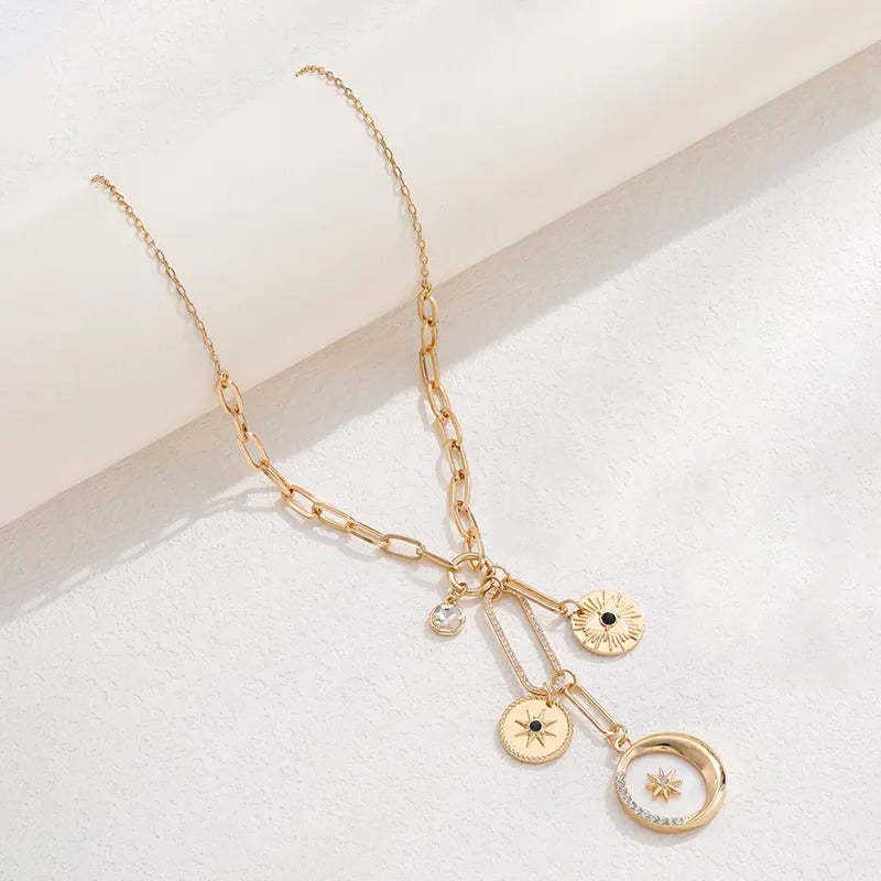 Pendentif lune et soleil doré