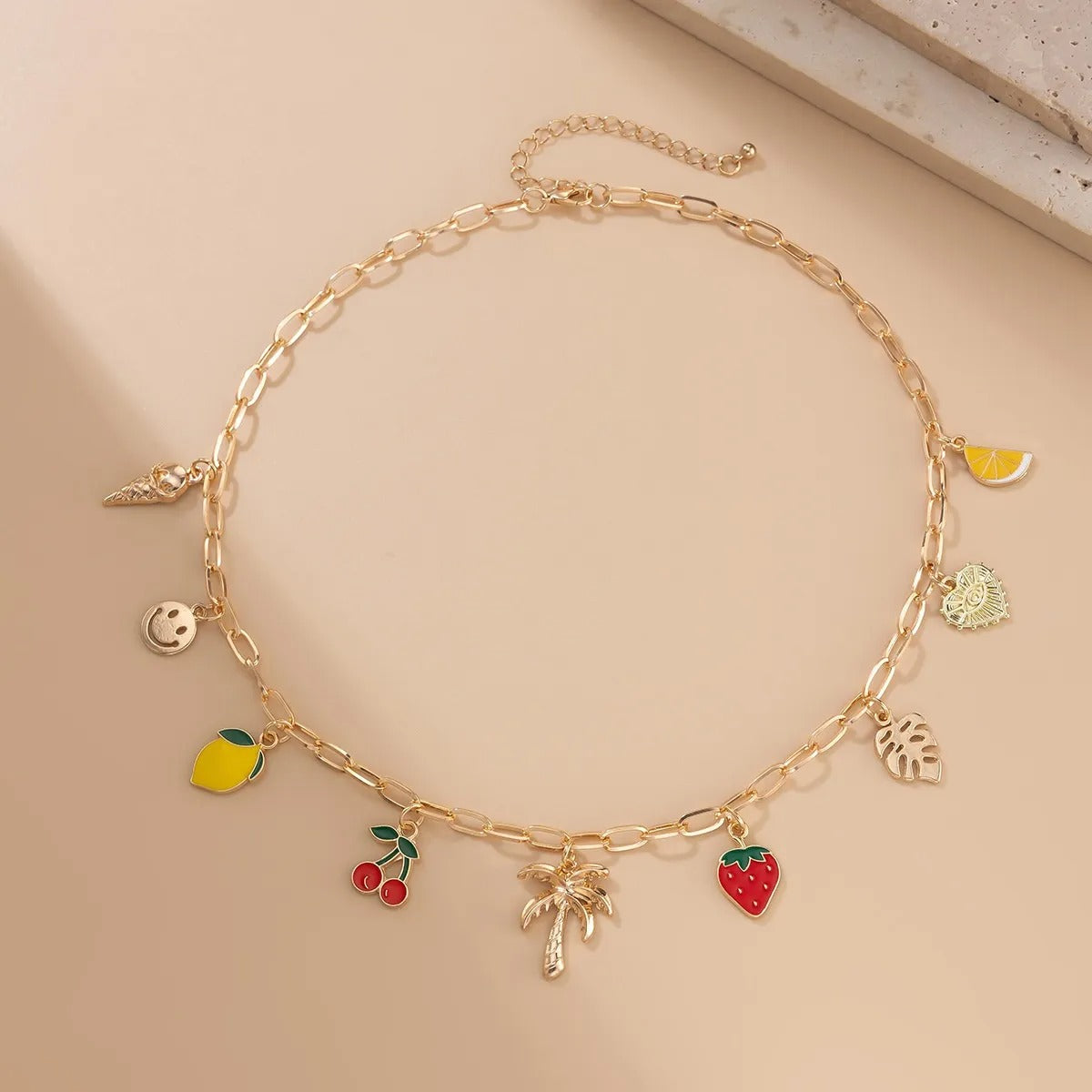 Collier pampilles doré fruits