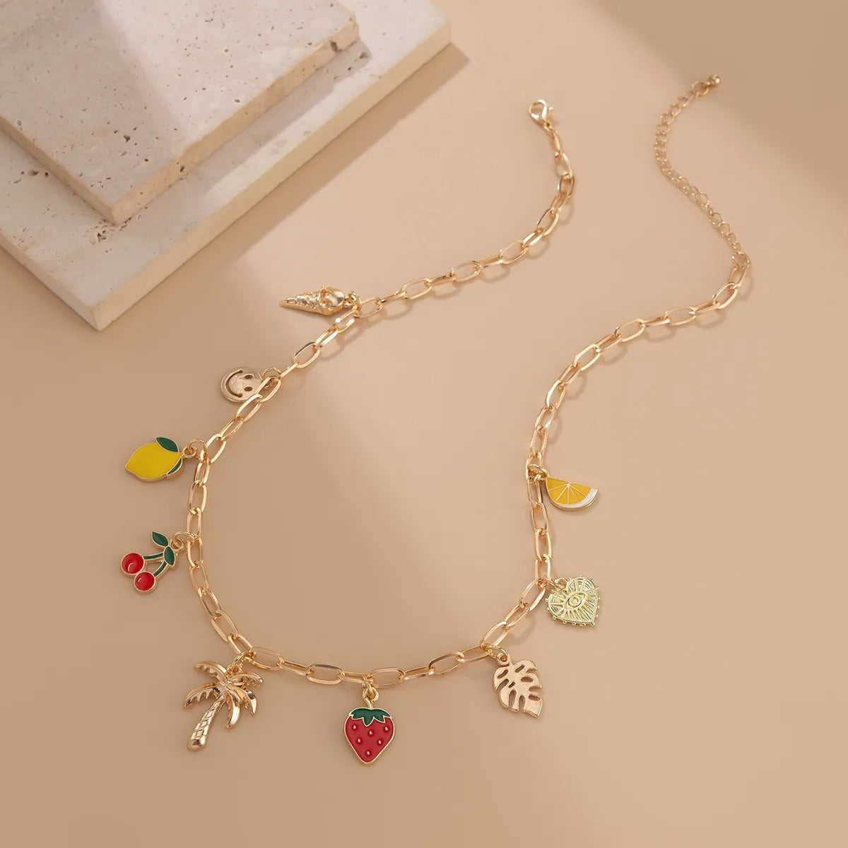 Collier pampilles doré fruits