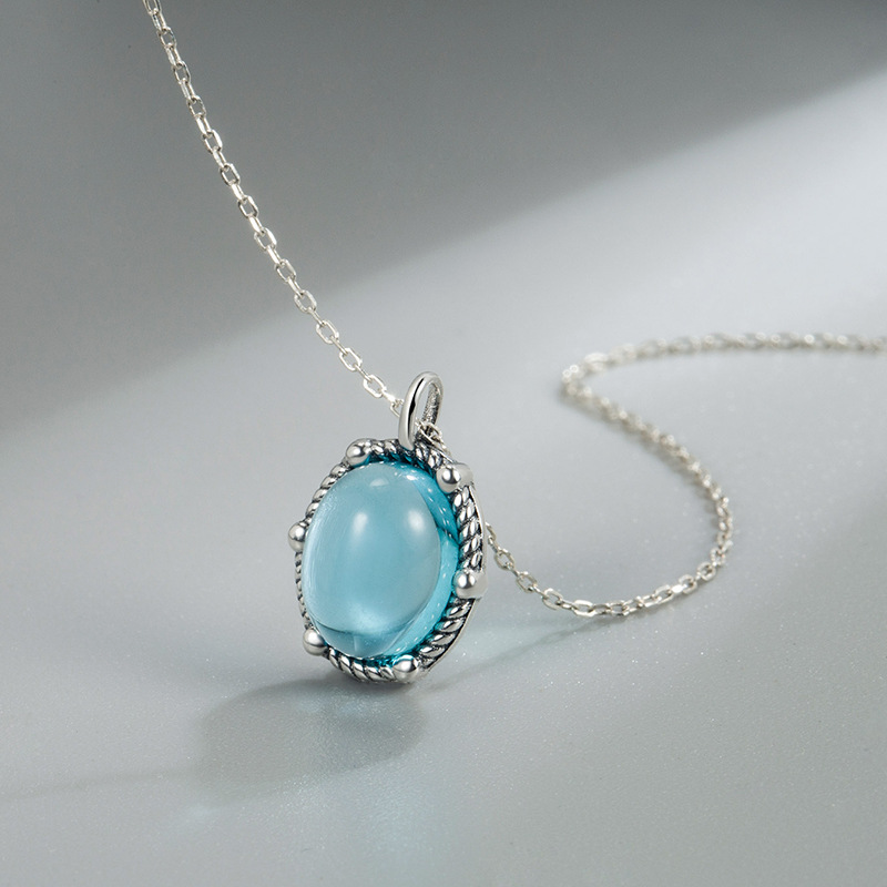 COLLIER EN ARGENT MOTIF FLEUR AVEC PIERRES BLEUES ET BLANCHES