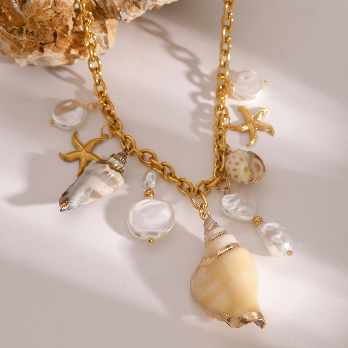 Collier pampilles coquillages et perles