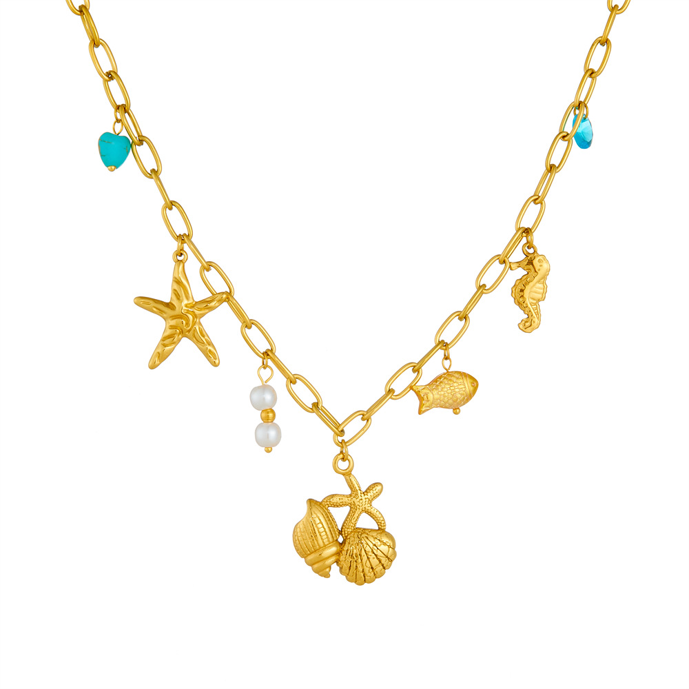 Collier pampilles doré coquillages et étoiles