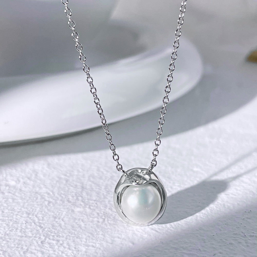 Collier rond avec perle nacrée