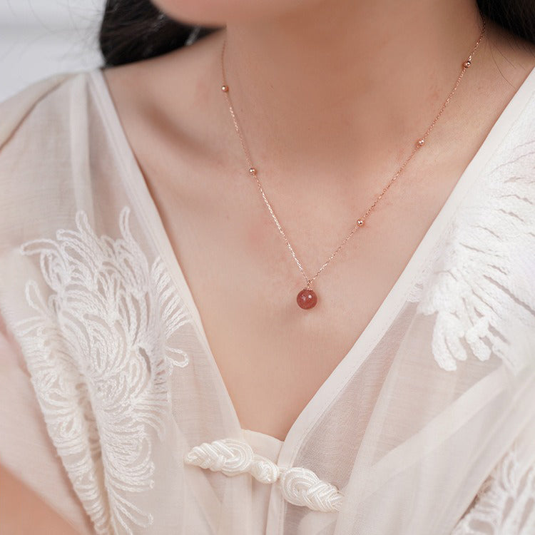 Pendentif rond avec pierre rose moderne