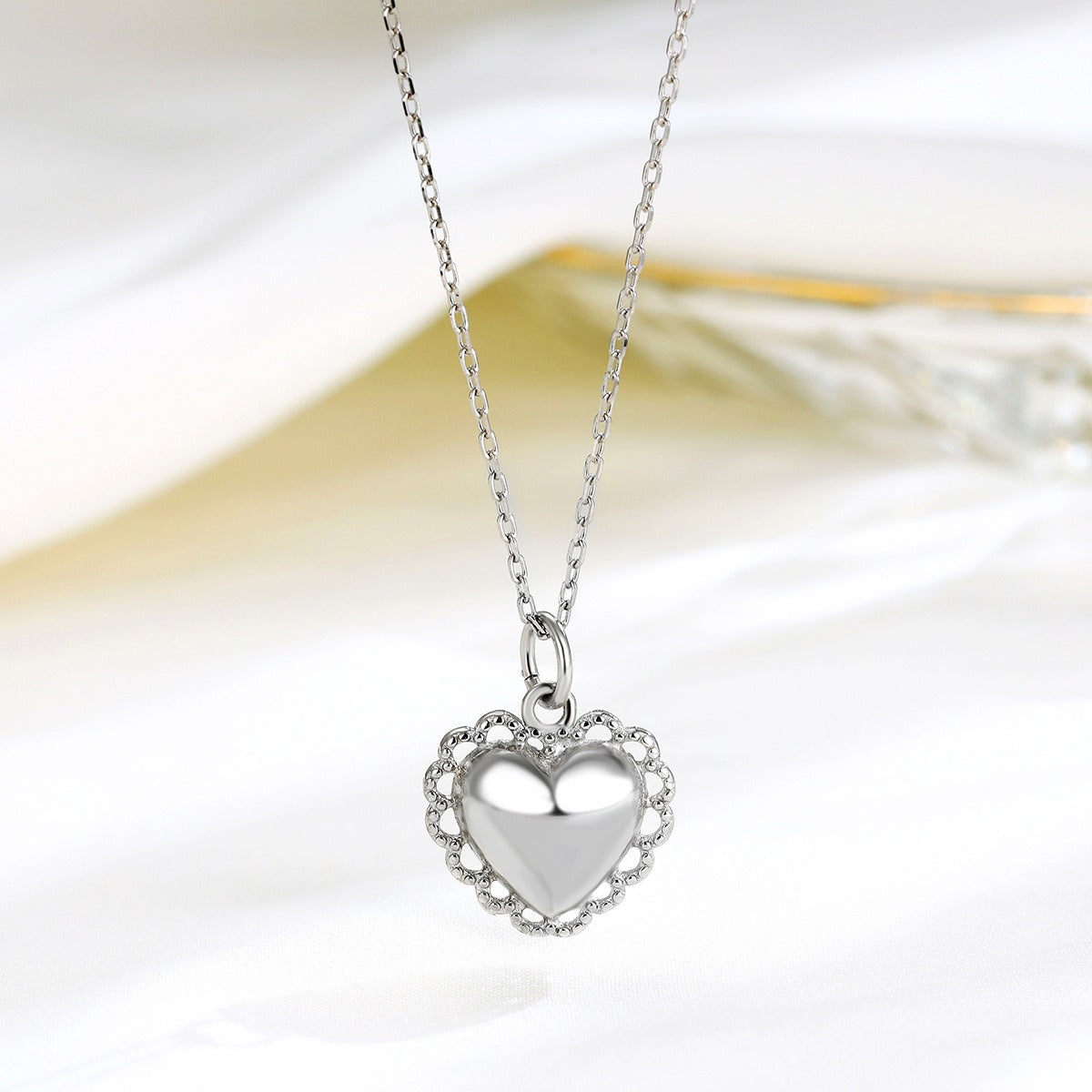 Pendentif cœur sacré