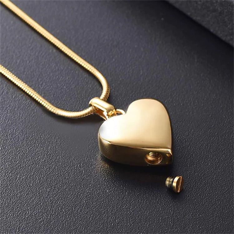 Collier cœur avec empreinte d'animaux