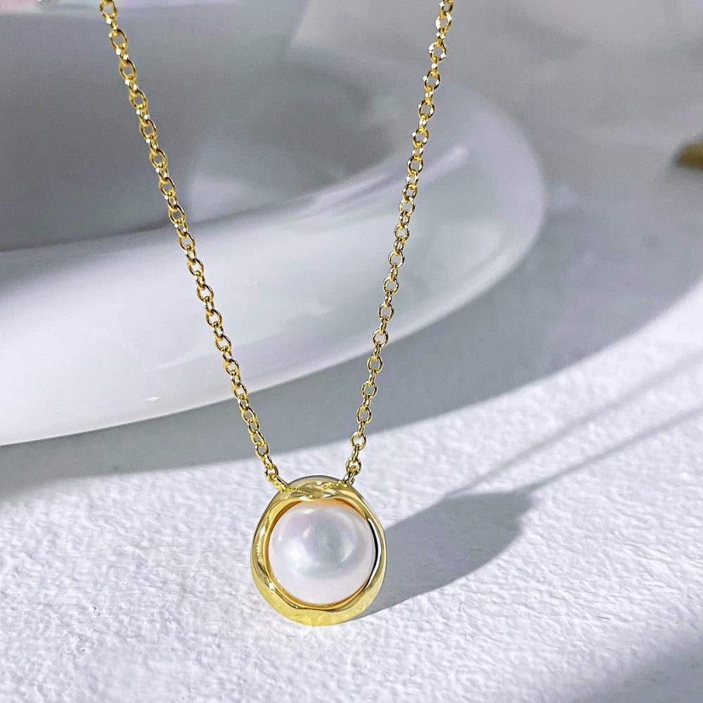 Collier rond avec perle nacrée