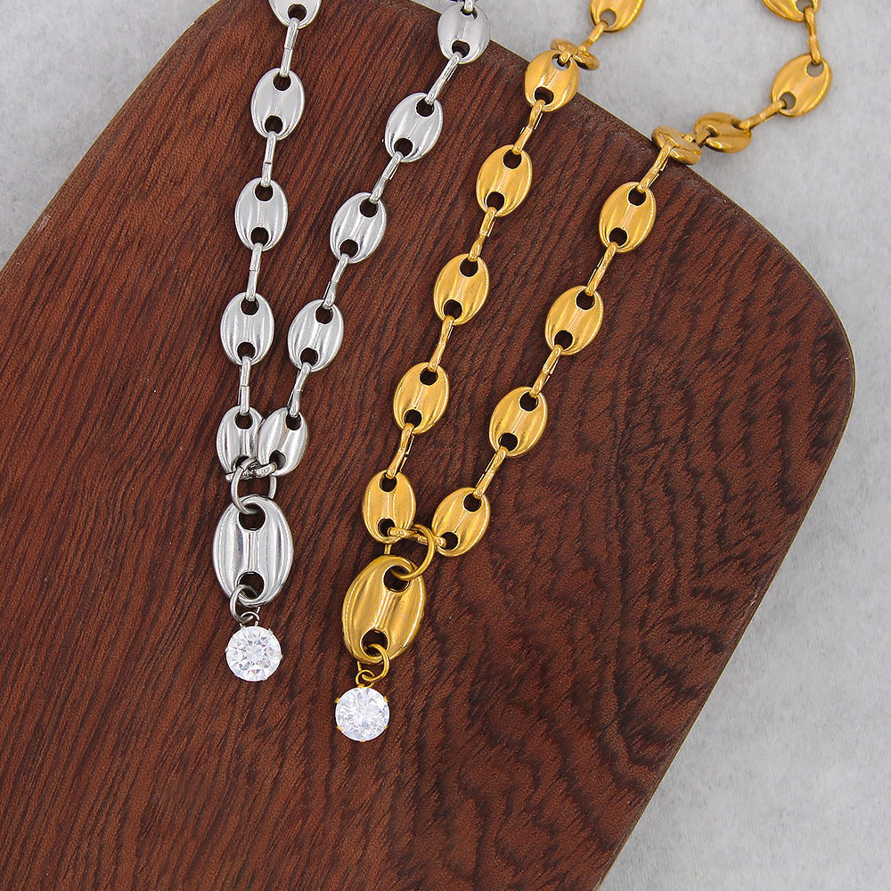 Collier grain de café avec pierre étincelante