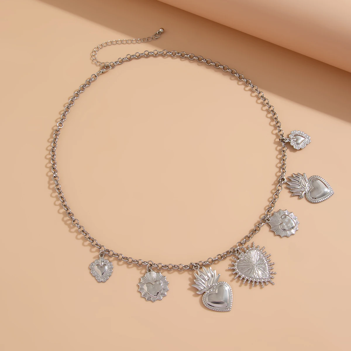 Collier pampilles cœur sacré argenté