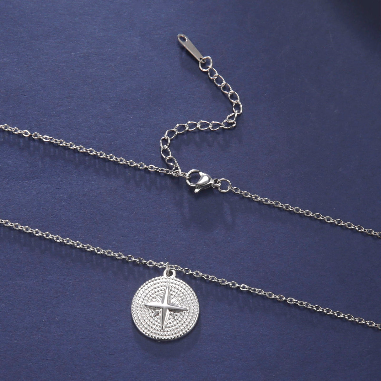 Collier boussole argenté