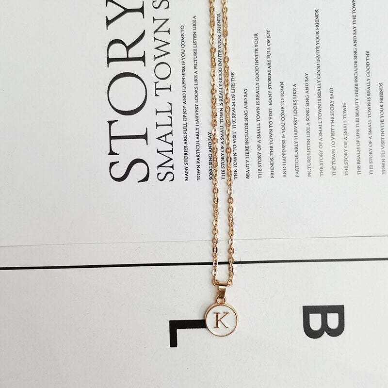 Collier initiale médaille