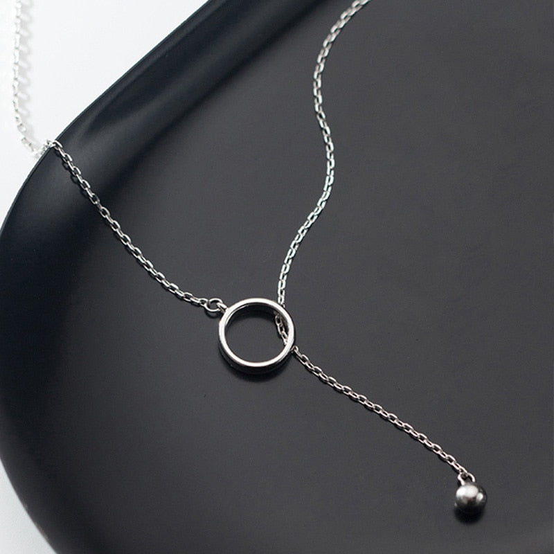 Collier cercle et boule minimaliste