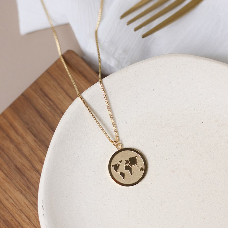 Collier carte du monde doré