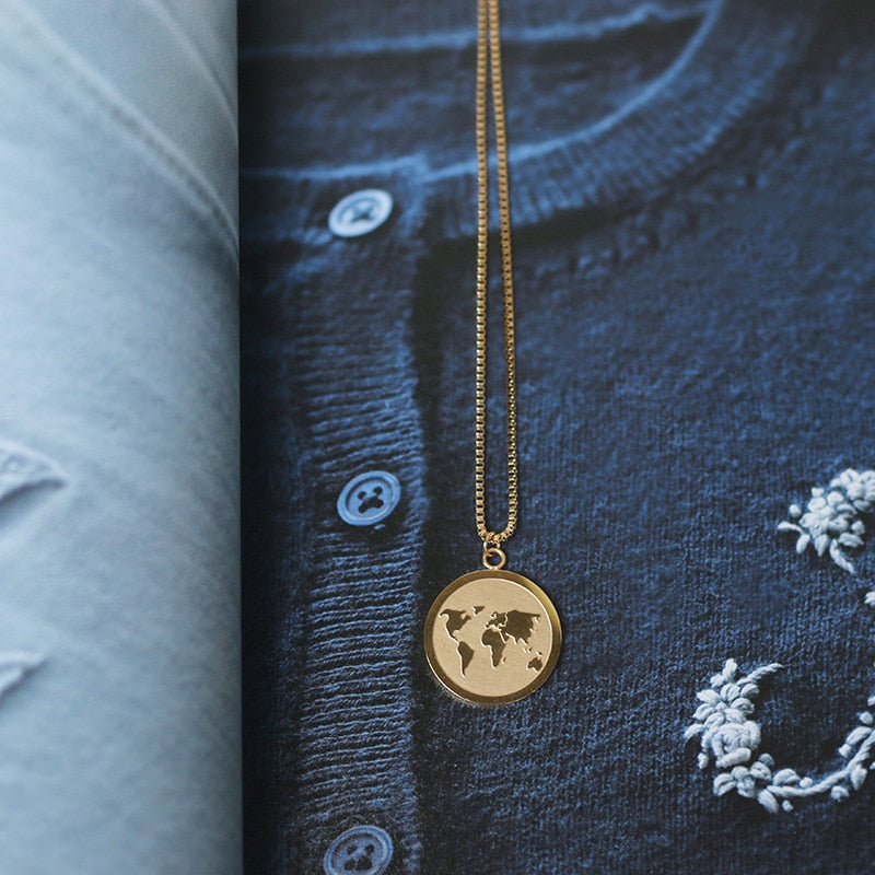 Collier carte du monde doré