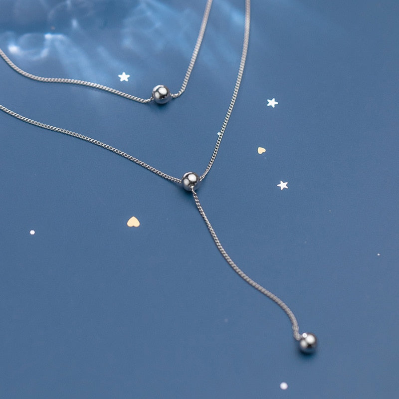 Pendentif ras de cou boules