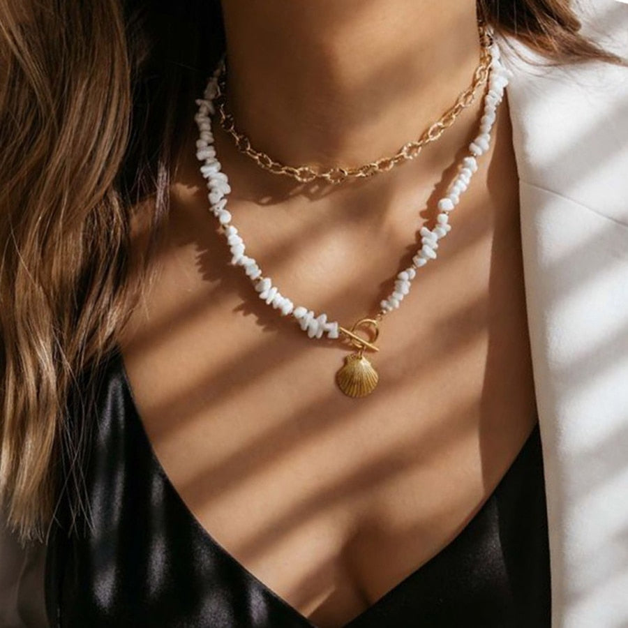 Collier coquillage blanc et or