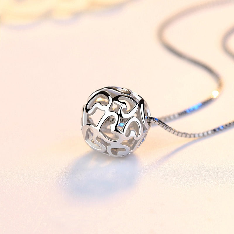 Pendentif boule de cœurs