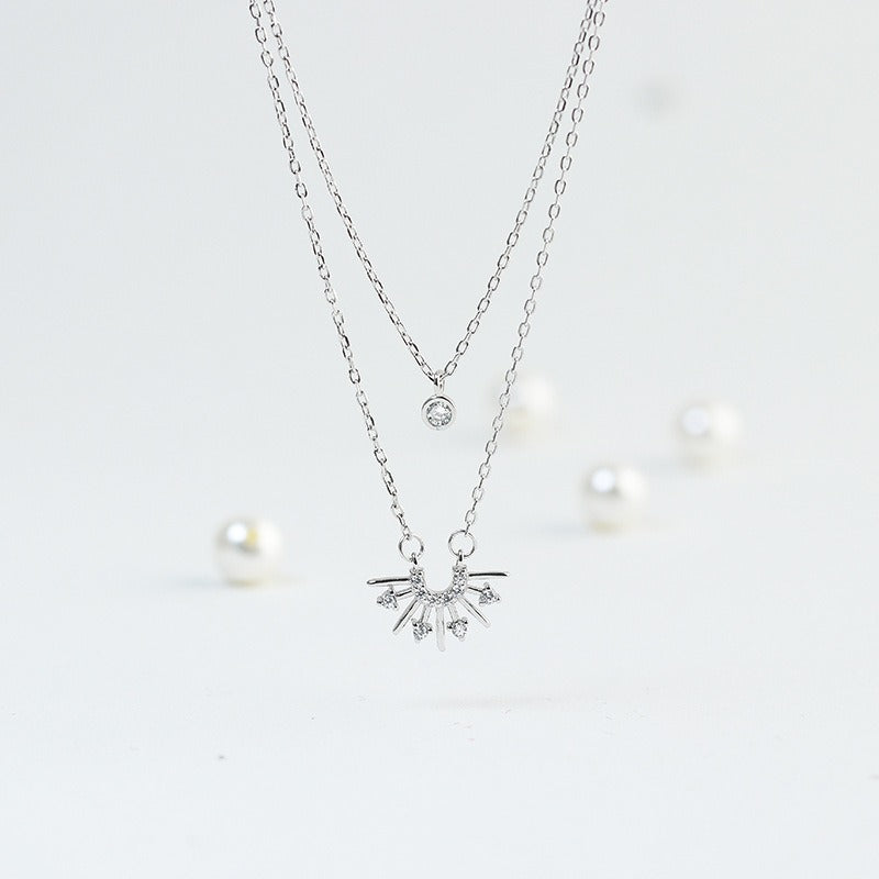 Pendentif soleil argent