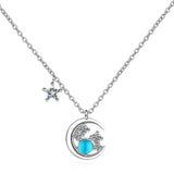 Pendentif lune et étoile bleu