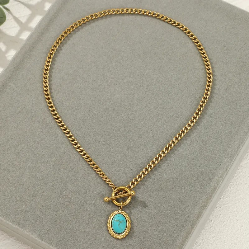 Collier doré avec pendentif en pierre turquoise vintage