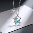 Pendentif lune et étoile bleu