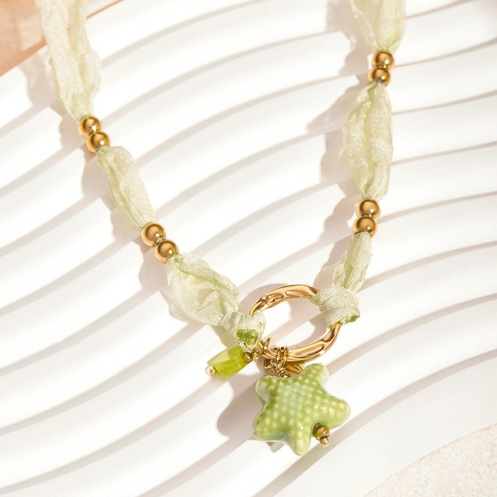 Collier étoilé - Couleur vert et or