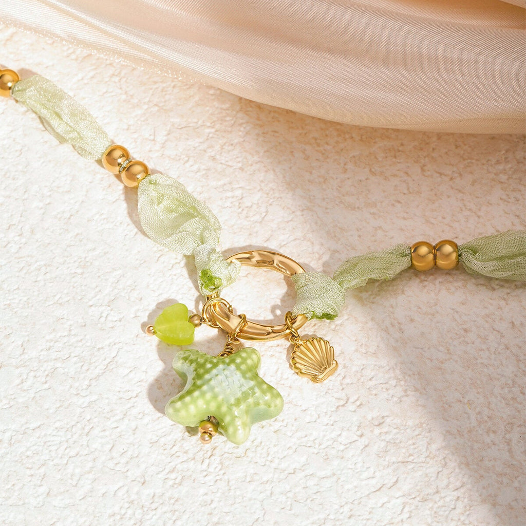 Collier étoilé - Couleur vert et or