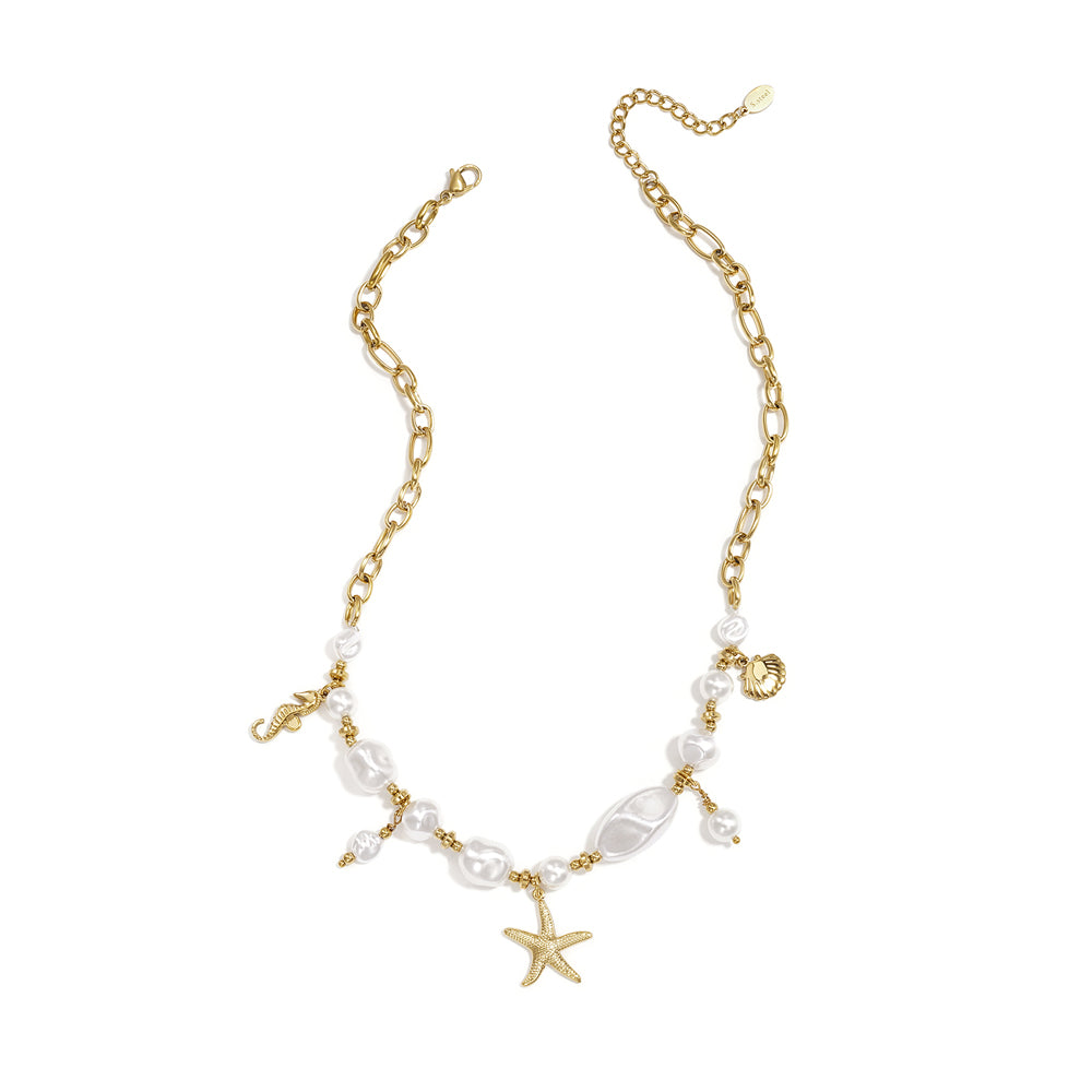 Collier chaîne femme inspiration marine à perles d’imitation et pendentifs dorés