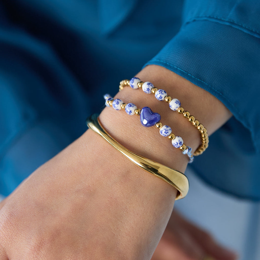 Bracelet en perles pleines à motif floral bleu