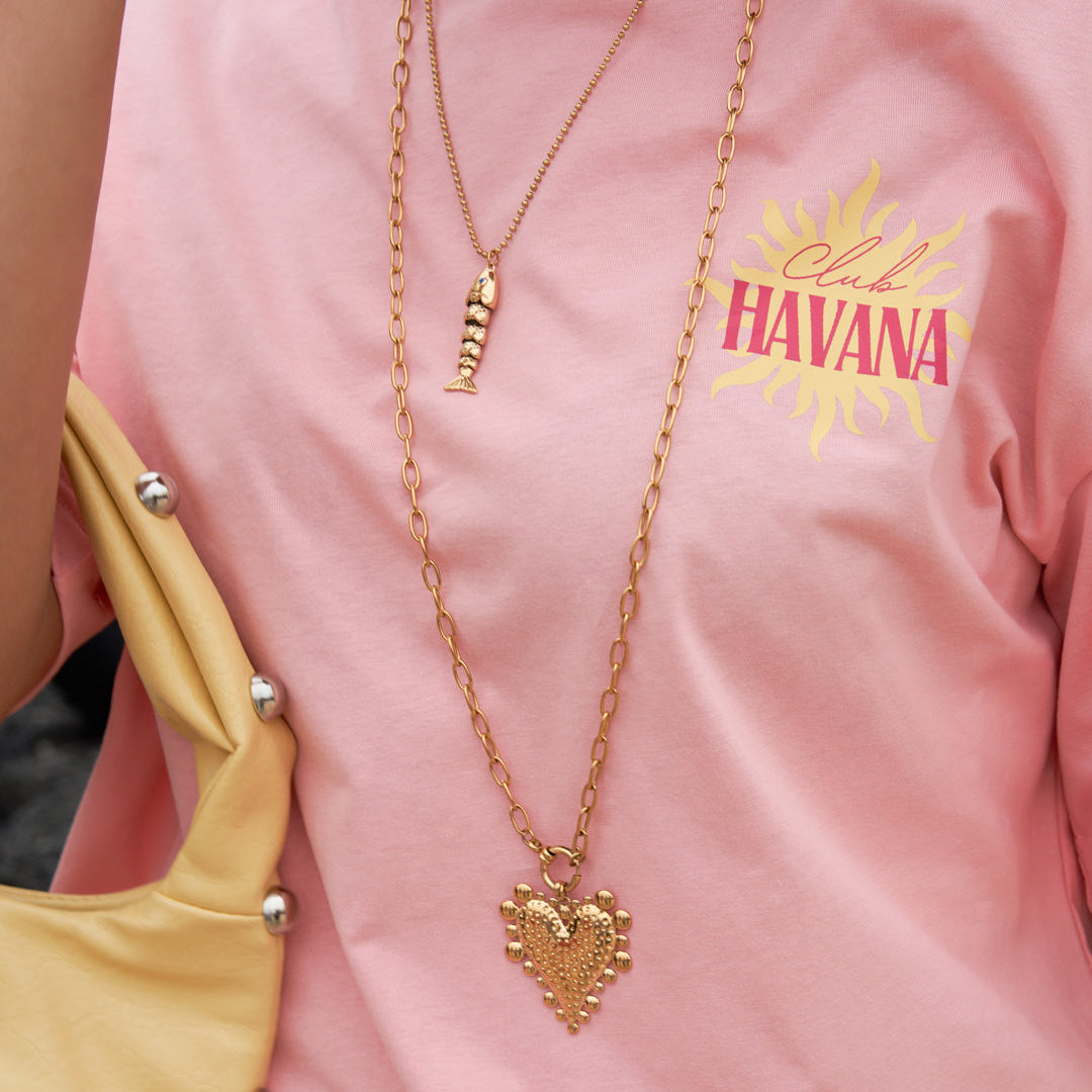 Long collier avec un pendentif en forme de cœur épais