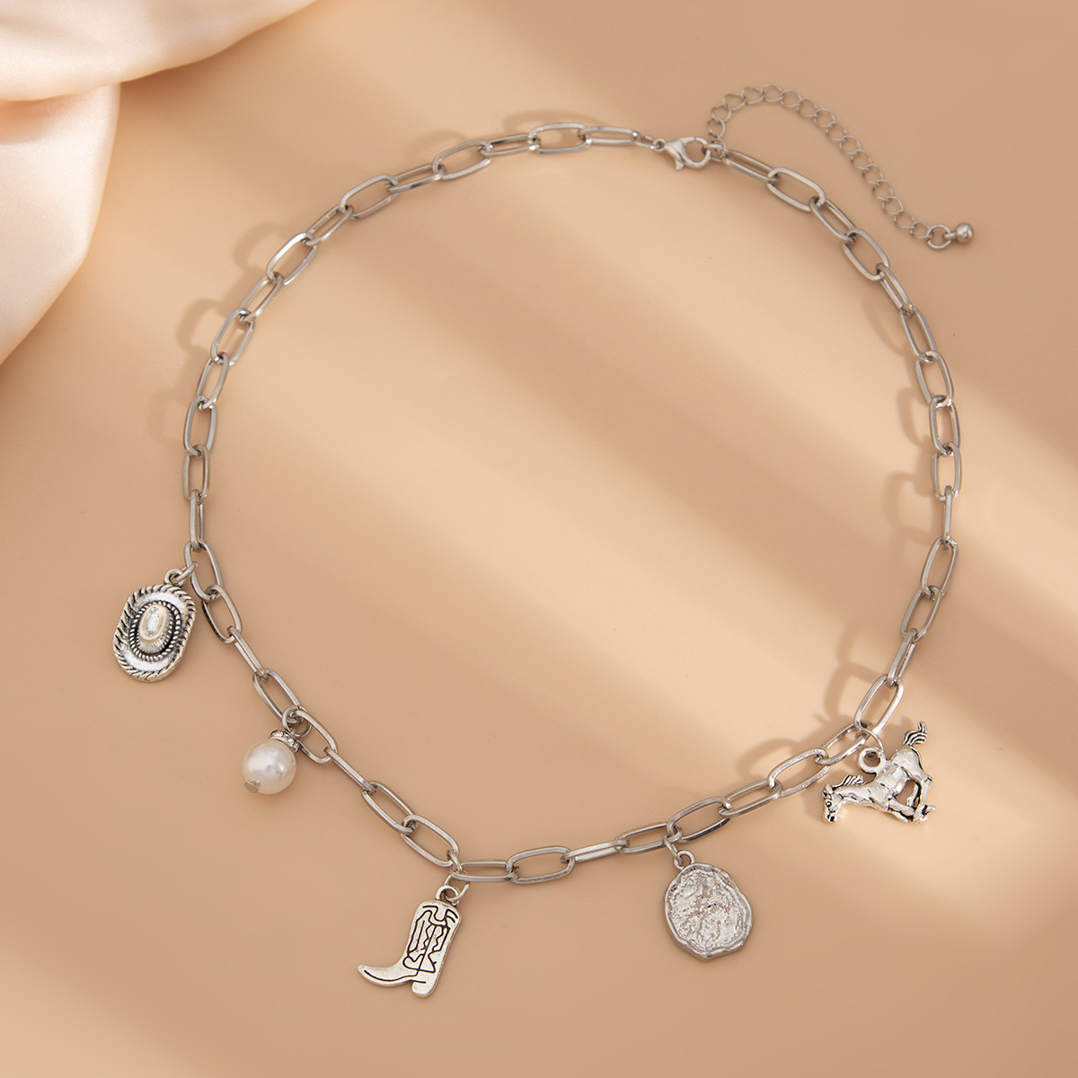 Collier pampilles cowboy et perle