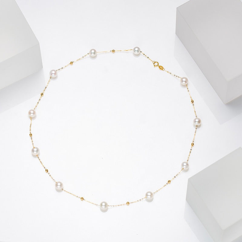 Collier perle chic et doré moderne