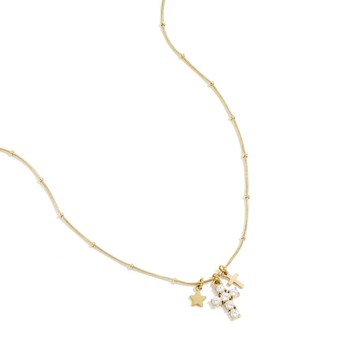 Collier avec breloques en forme de croix et d'étoile