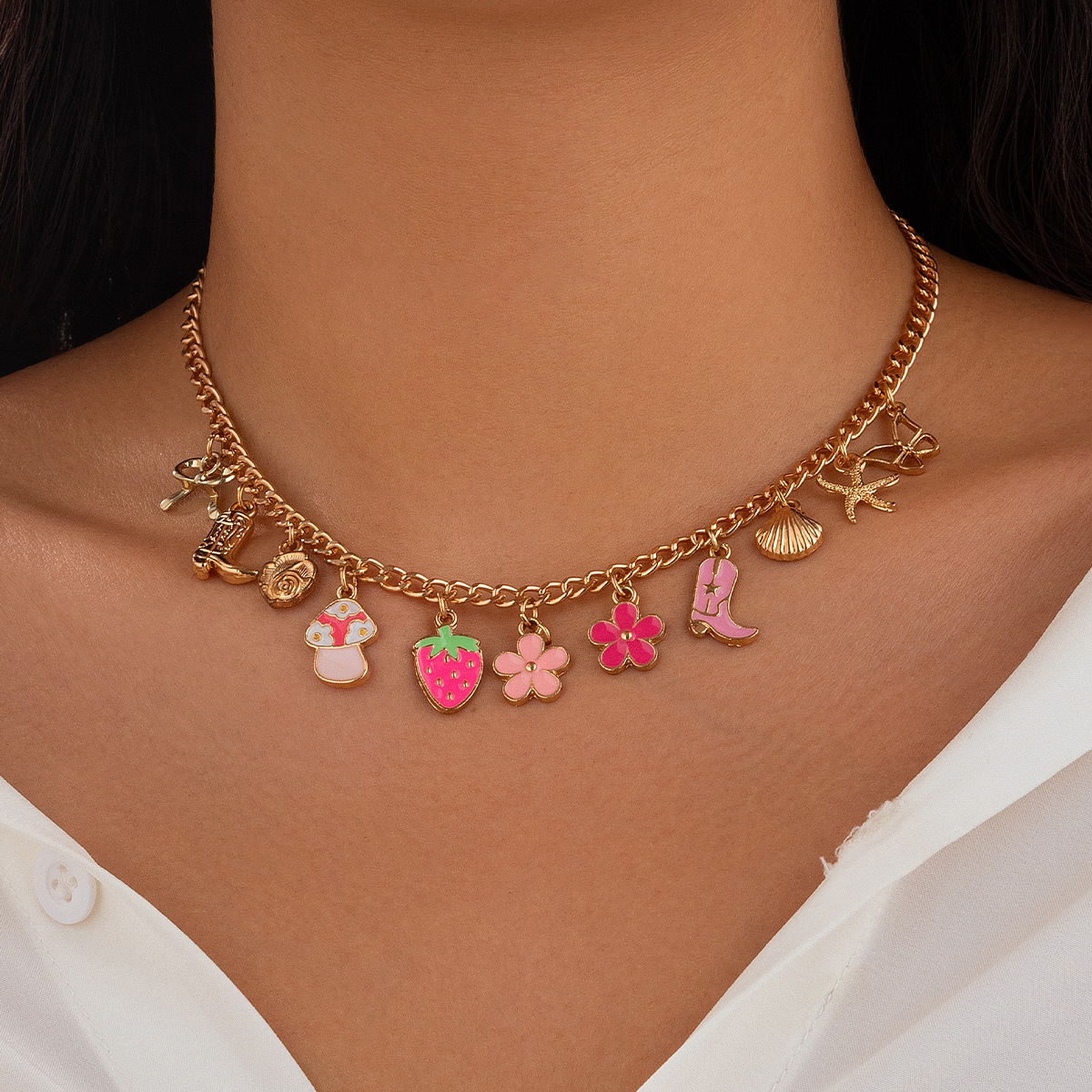 Collier pampilles multicharmes dorées