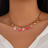 Collier pampilles multicharmes dorées