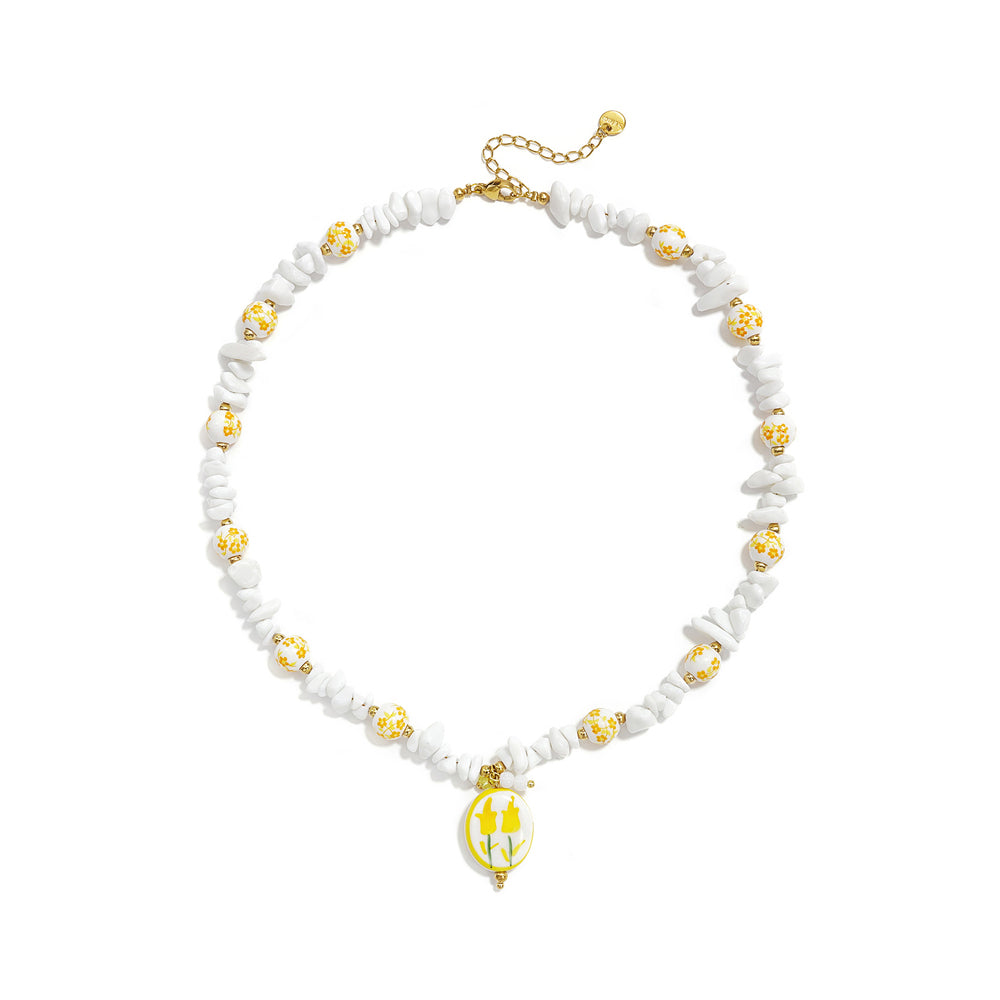 Collier perles d’imitation et céramique à pendentif floral jaune