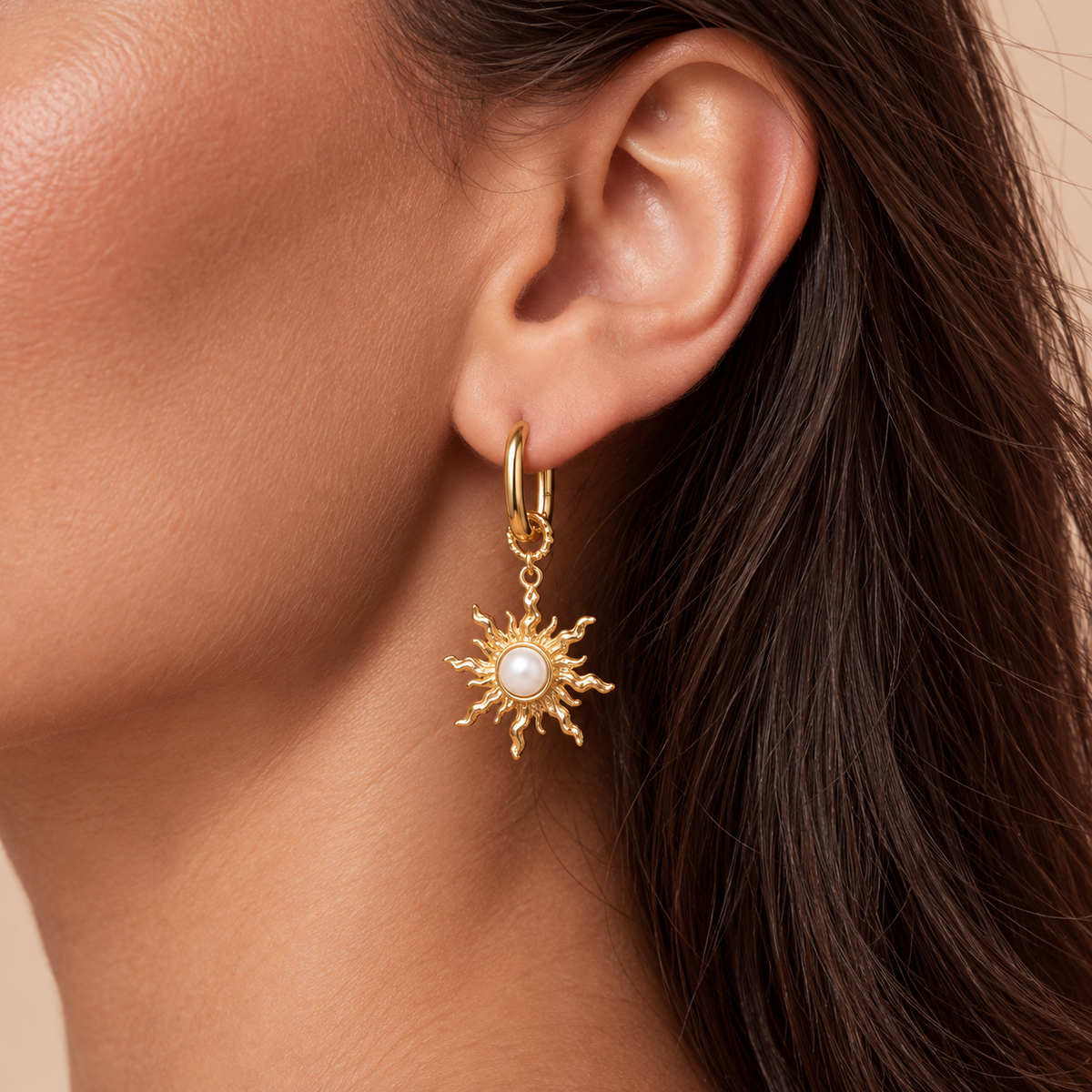 Boucles d’oreilles créoles ovales à breloque soleil