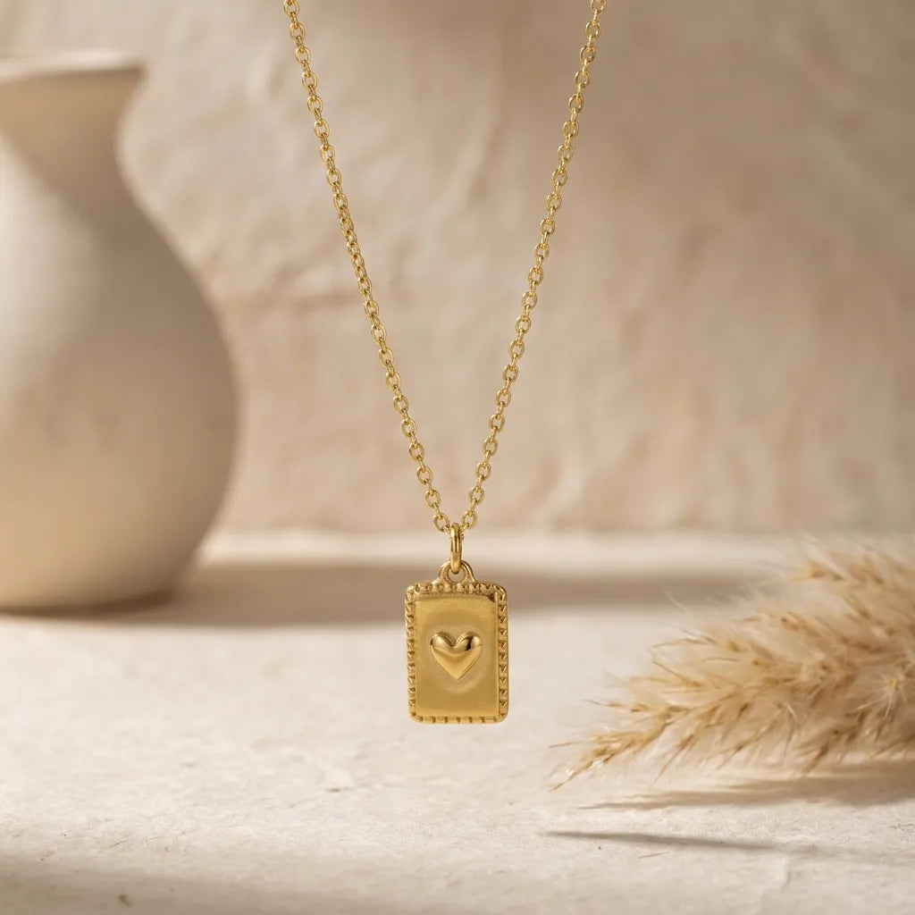 Collier pendentif plaque cœur doré