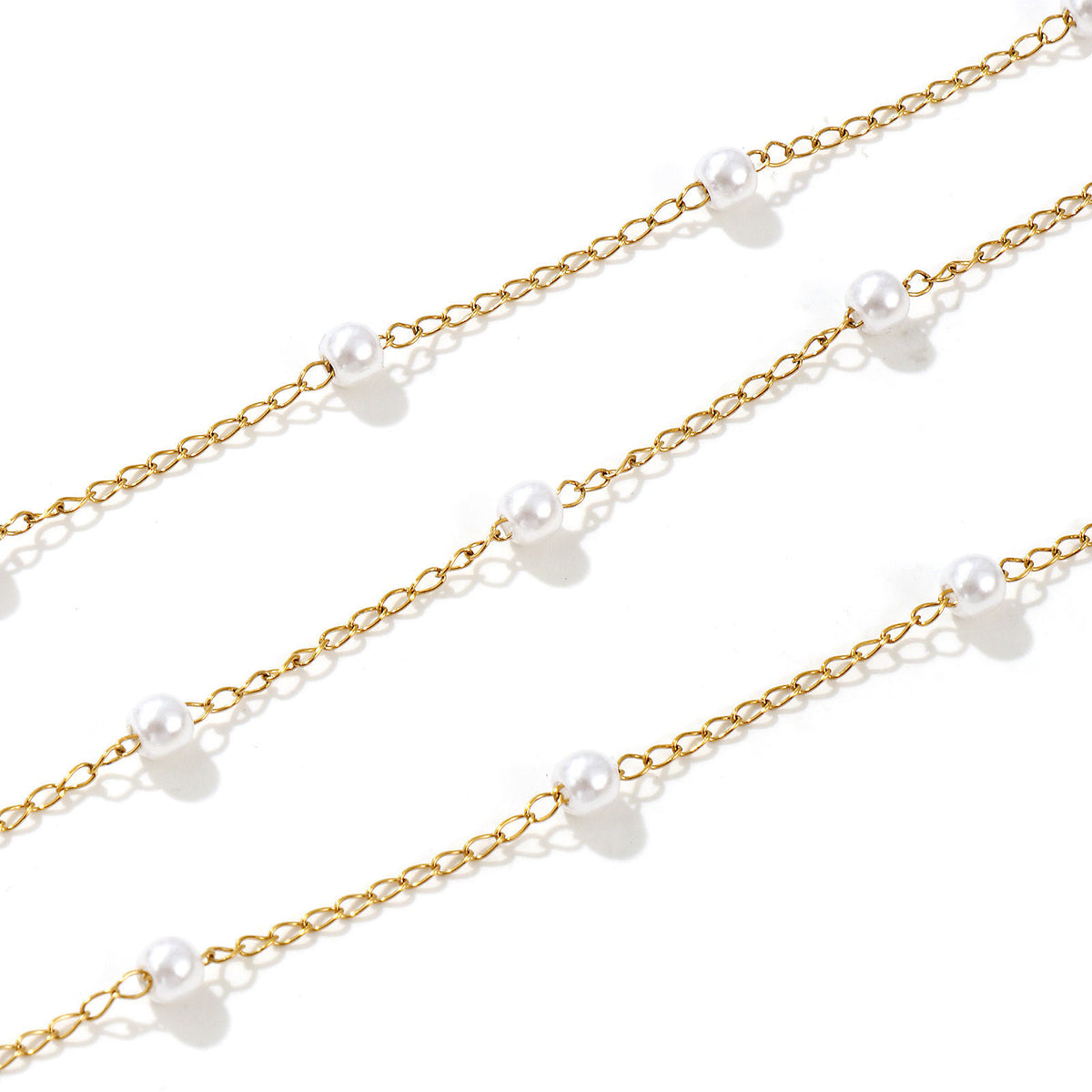 Collier perles d'imitation espacées doré