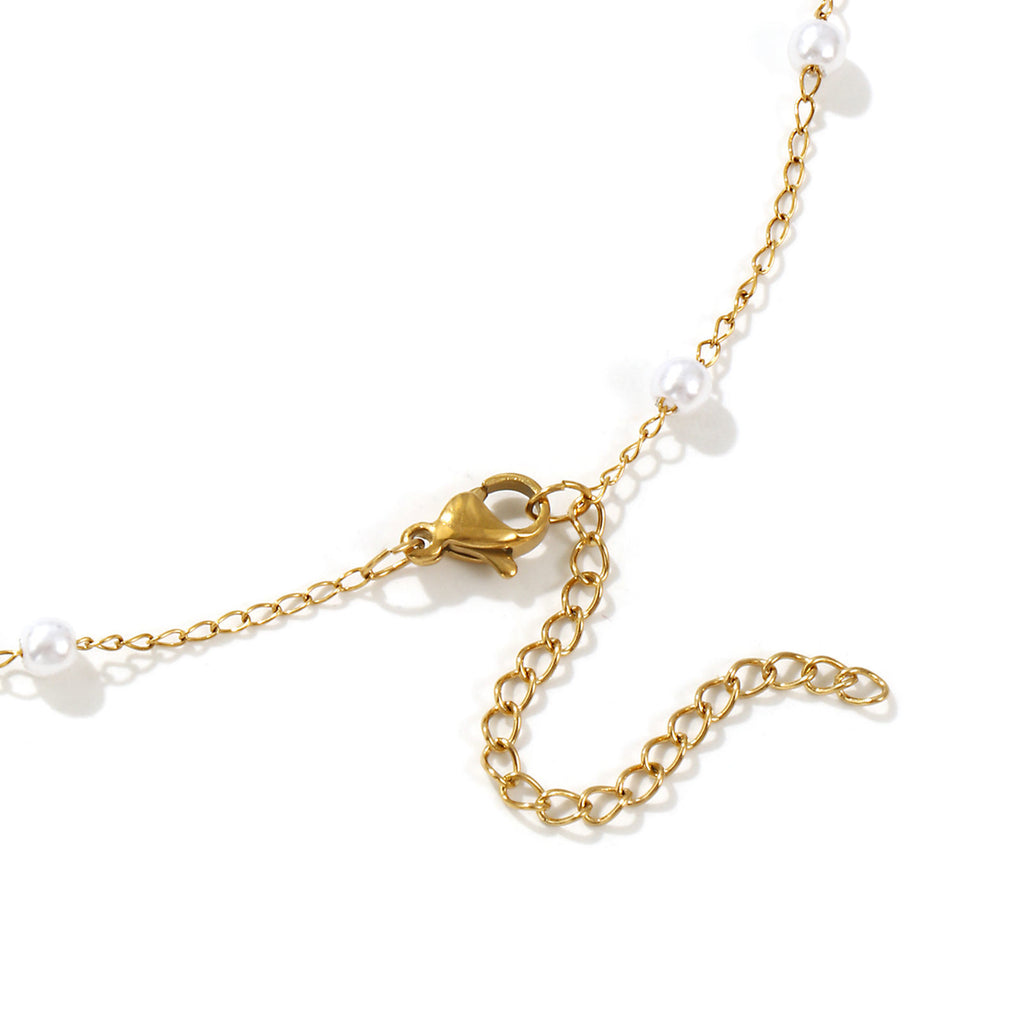 Collier perles d'imitation espacées doré