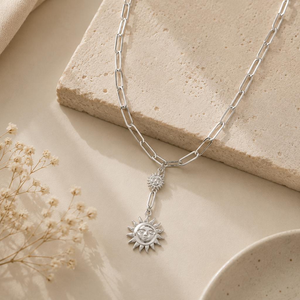 Collier double pendentif soleil
