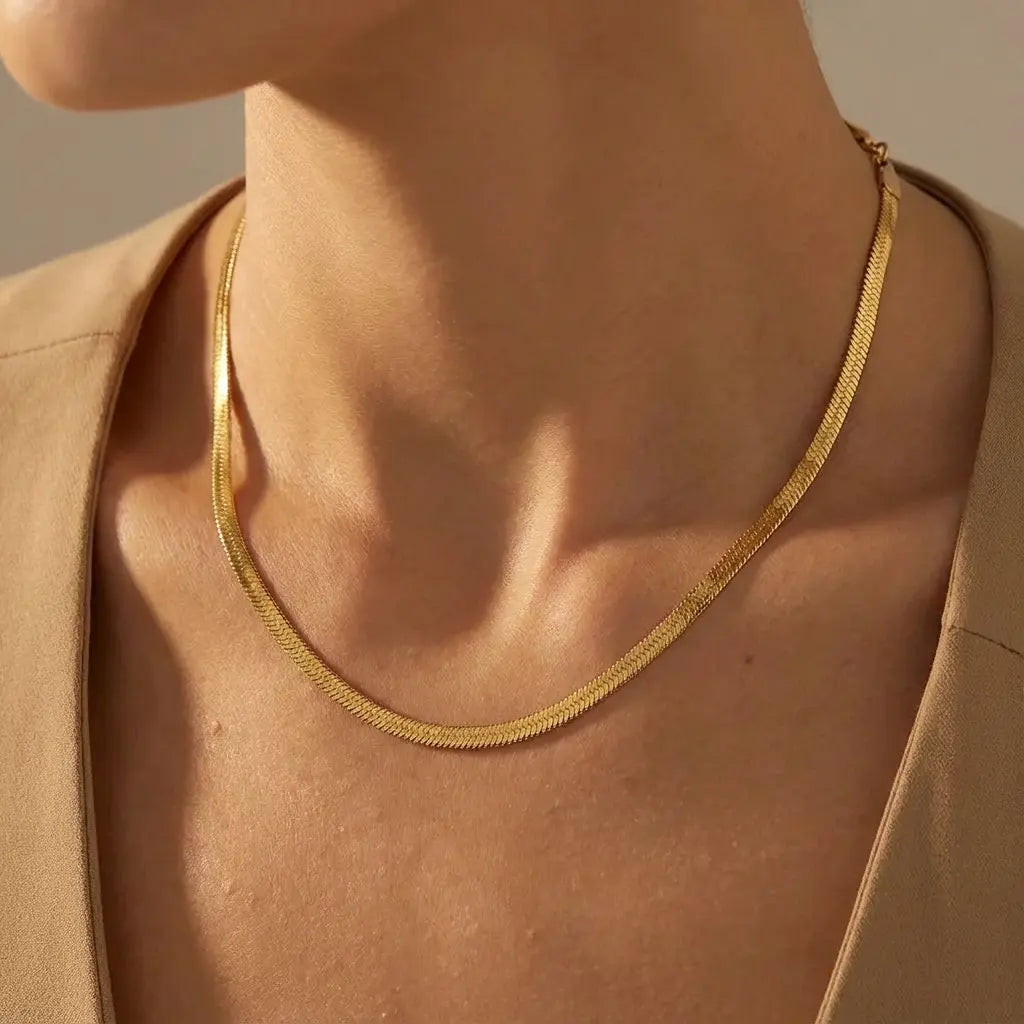 Collier maille serpent plate doré