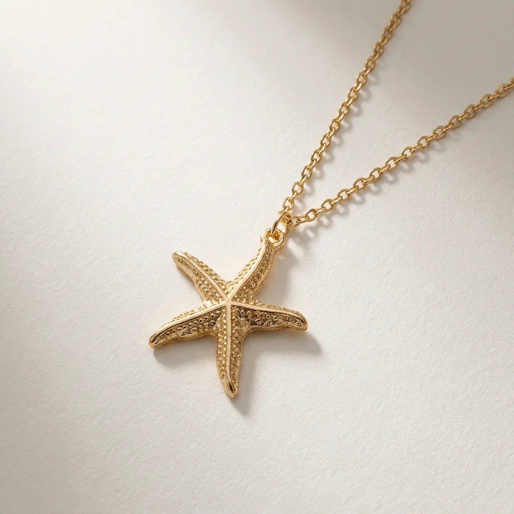 Collier coquillage étoile de mer doré