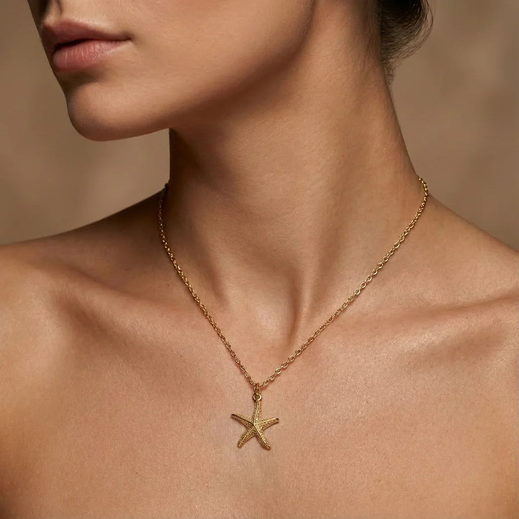 Collier coquillage étoile de mer doré