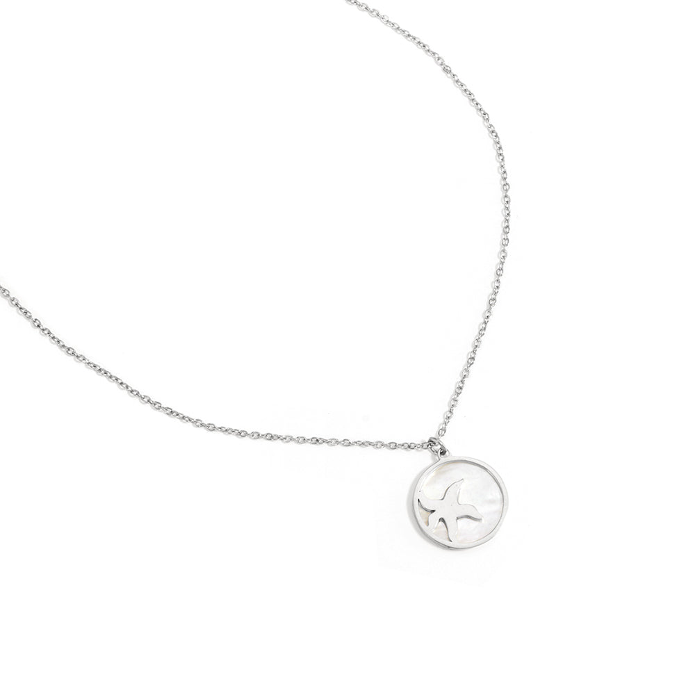 Collier étoile de mer sur médaillon coquillage