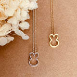 Collier lapin tendance design minimaliste