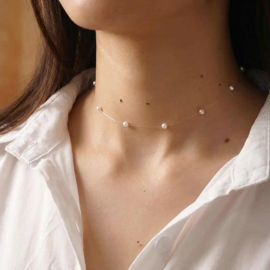 Collier perle fil transparent