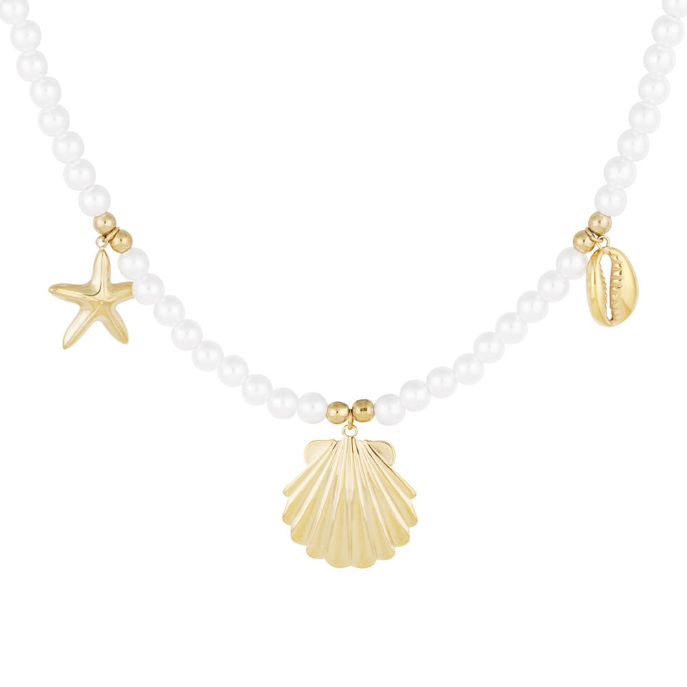 Collier perles d'imitation aspect nacré et breloques marines dorées