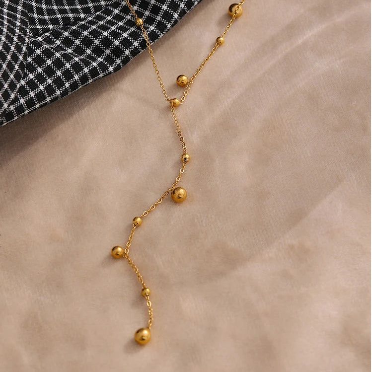 Collier en Y à pampilles doré