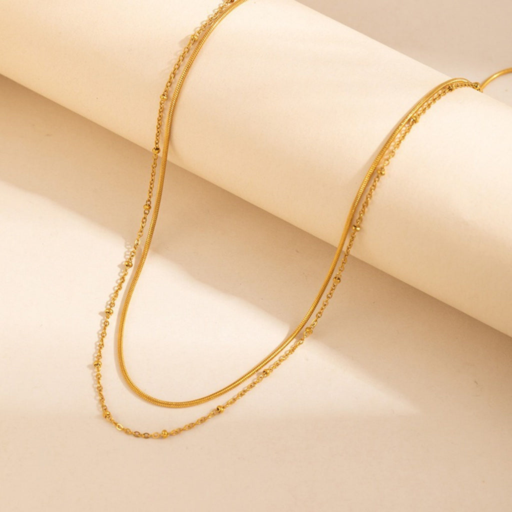 Collier multirang doré chaîne serpent et satellite